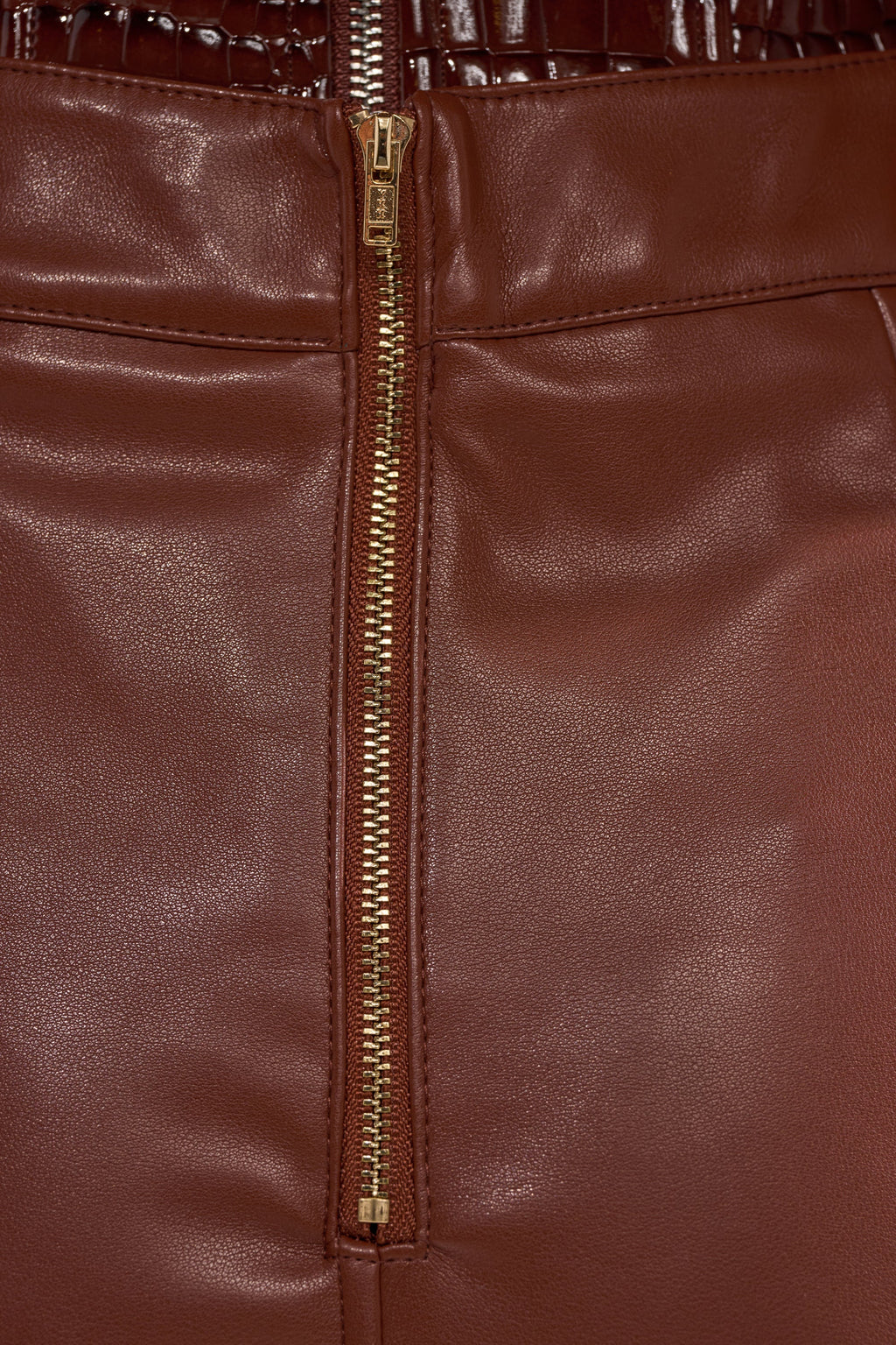 SOMETHING DIFFERENT FAUX LEATHER MIDI SKIRT