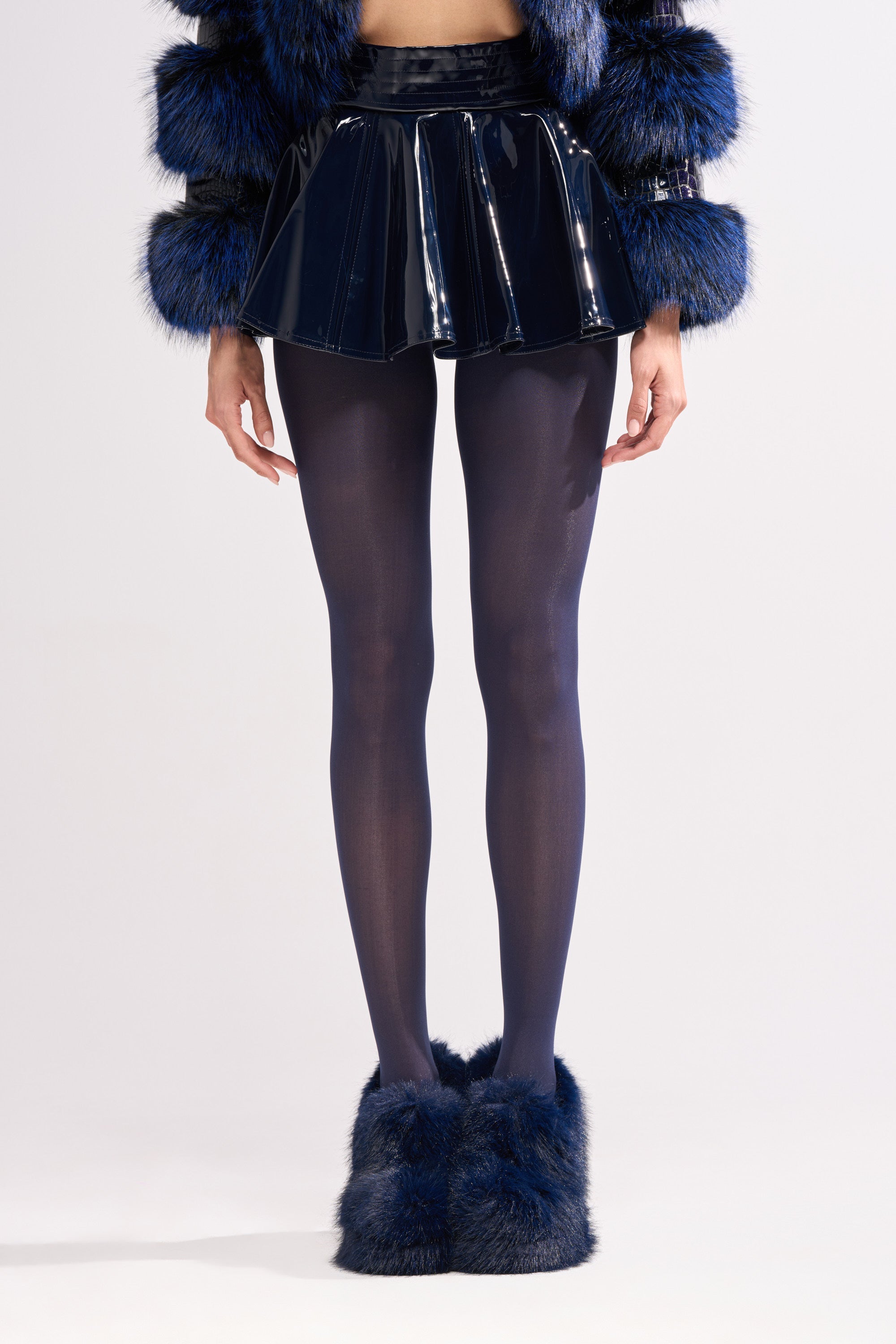 SHE IS ON FIRE FAUX LEATHER MINI SKIRT IN NAVY