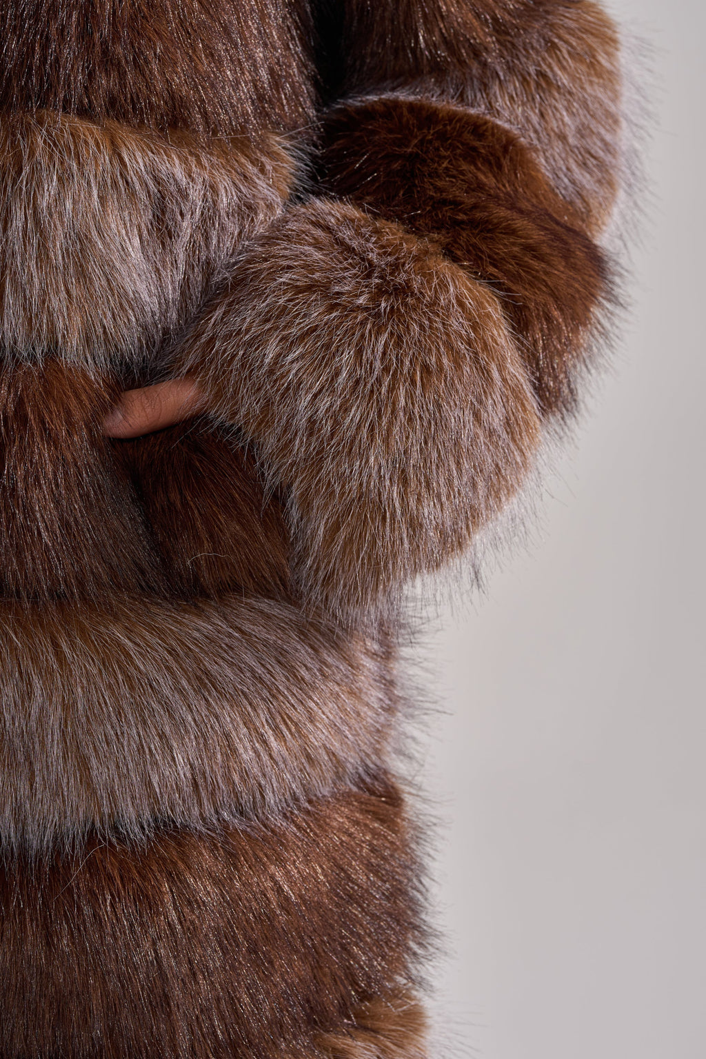LITTLE BIT OF SPICE PANELED FAUX FUR COAT
