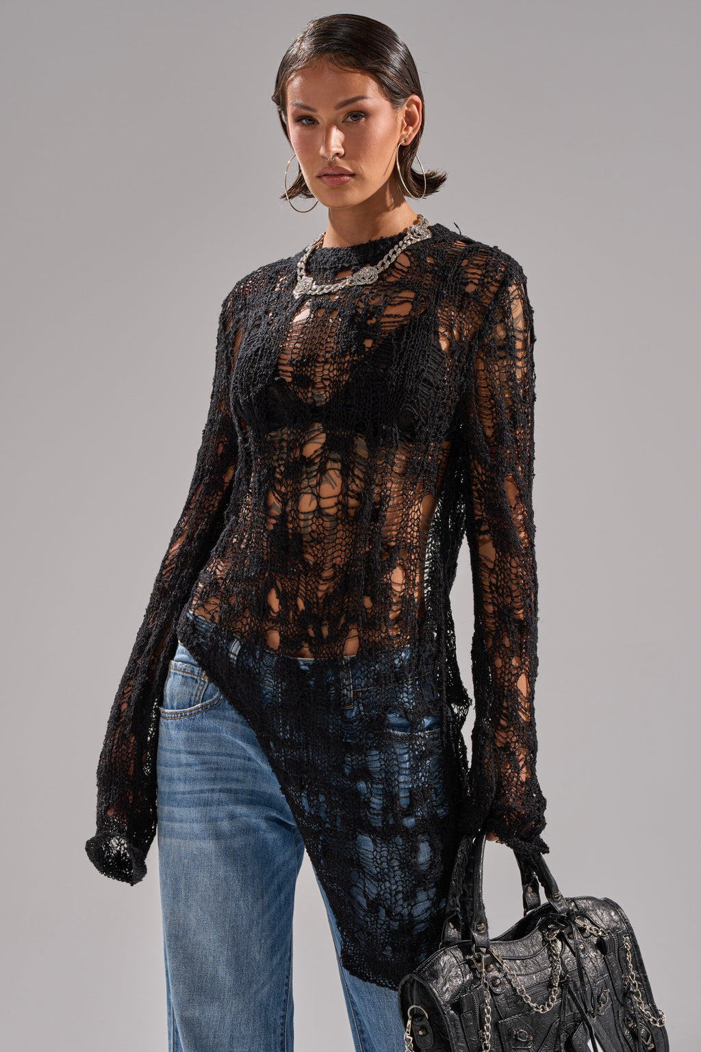 ASYMMETRICAL KNIT SWEATER